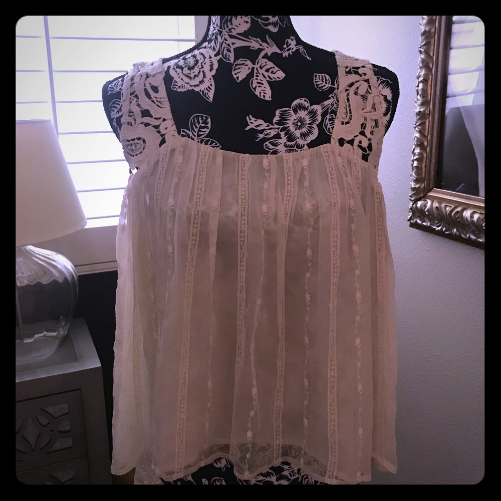 Beautiful ivory blouse by Anthropologie